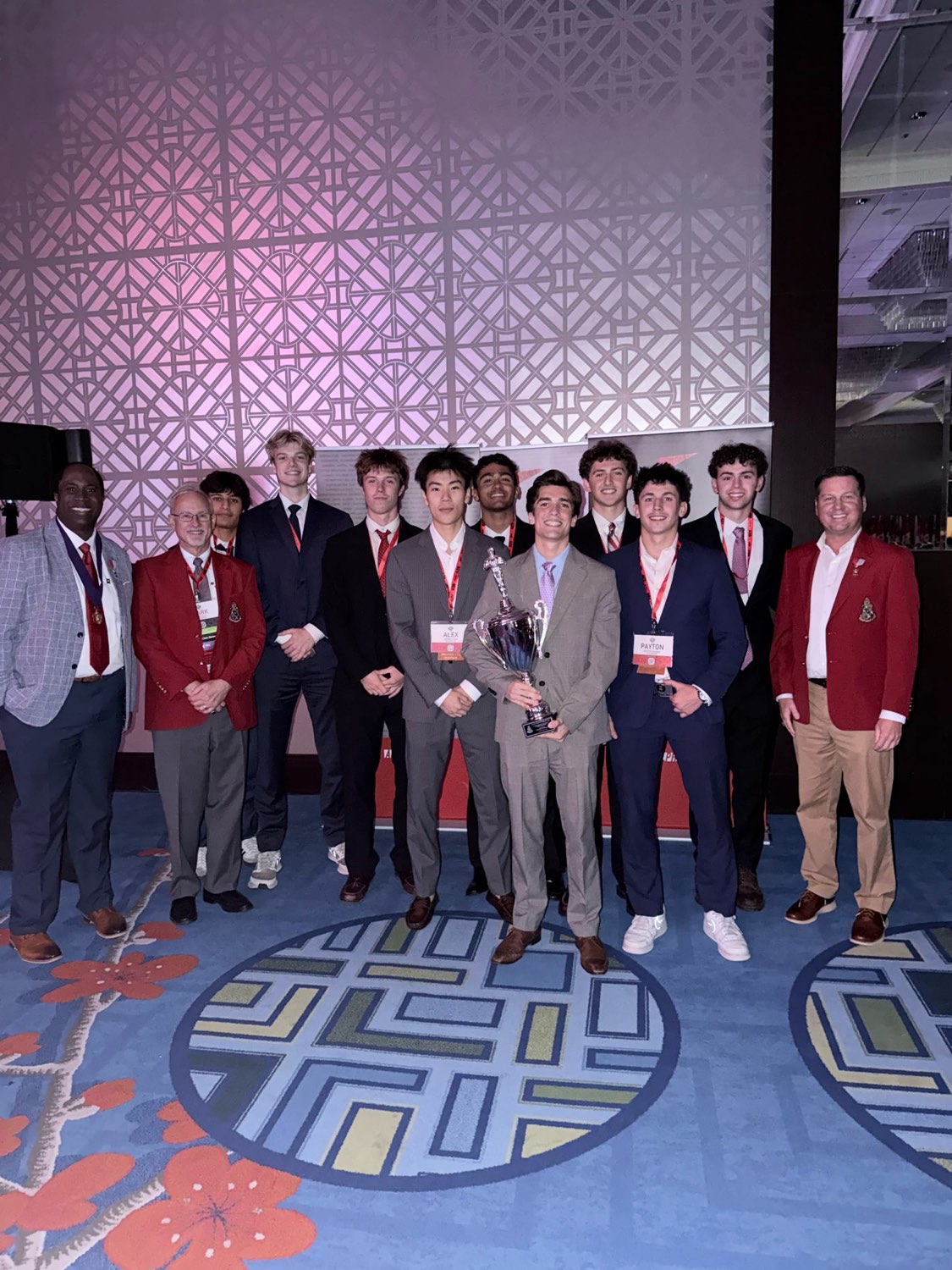 Mu Chapter brothers accepting the Grand Senior President's Cup at Grand Chapter